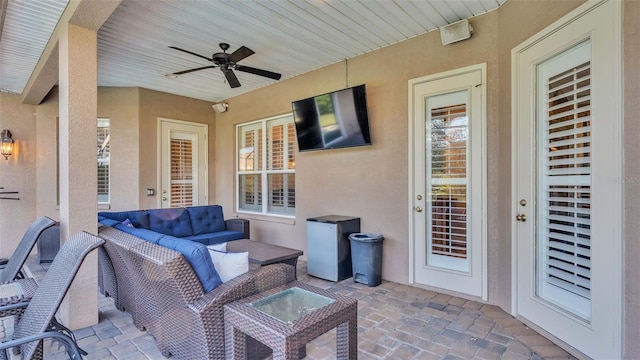 view of patio / terrace with ceiling fan and an outdoor hangout area