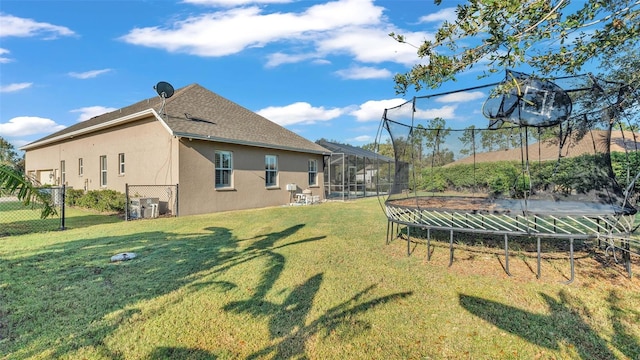 view of yard featuring a trampoline