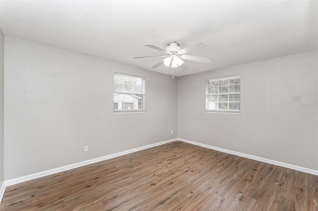 unfurnished room featuring ceiling fan and hardwood / wood-style flooring