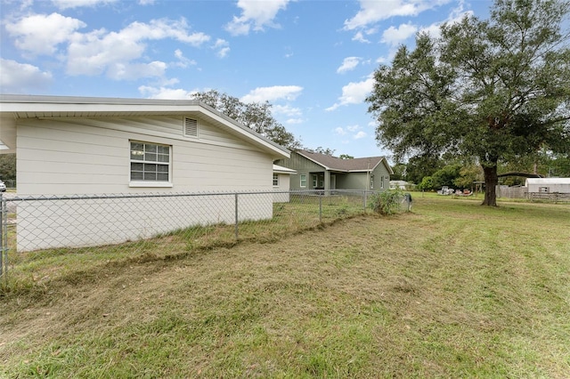 view of home's exterior featuring a lawn