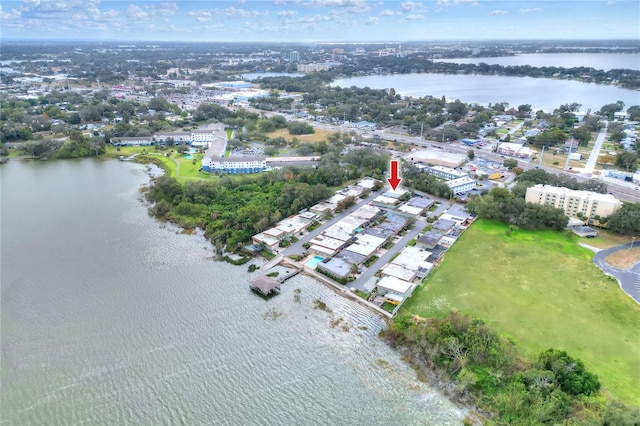 birds eye view of property featuring a water view