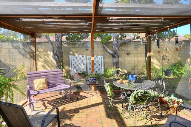 view of patio featuring a pergola