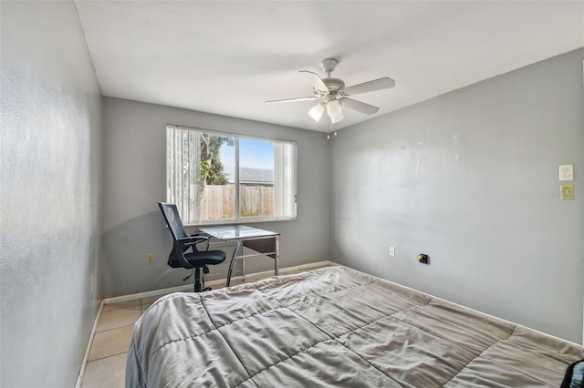 bedroom featuring ceiling fan and light tile patterned floors