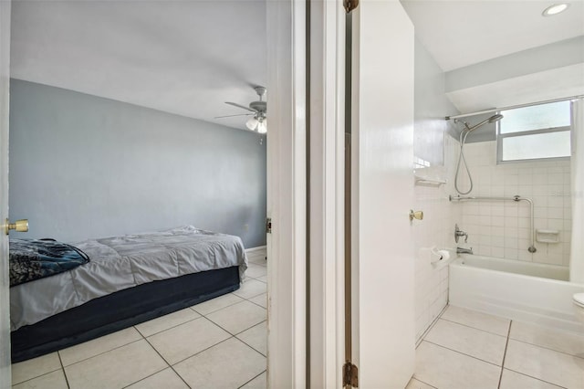 bedroom with ceiling fan and light tile patterned flooring