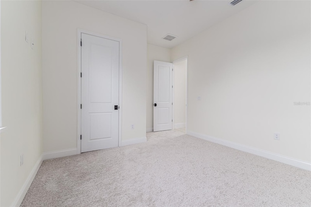 1001 Cody Bluffs Rd, Babson Park, FL 33827 - unfurnished bedroom featuring light colored carpet and baseboards