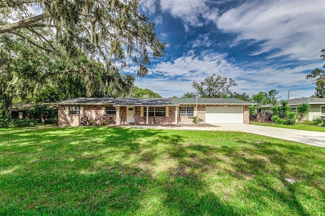 ranch-style house with a garage and a front lawn