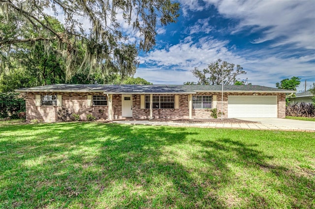 ranch-style house with a front lawn and a garage