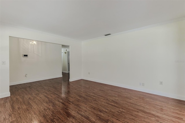 unfurnished room with crown molding and dark hardwood / wood-style floors