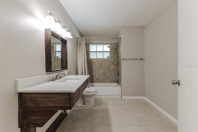 full bathroom with toilet, shower / bath combo, vanity, and tile patterned flooring