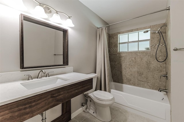 full bathroom featuring toilet, shower / bath combo, sink, and tile patterned flooring