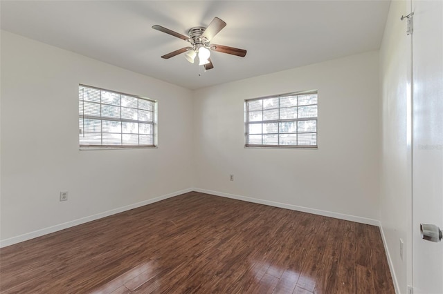 unfurnished room with ceiling fan and dark hardwood / wood-style flooring