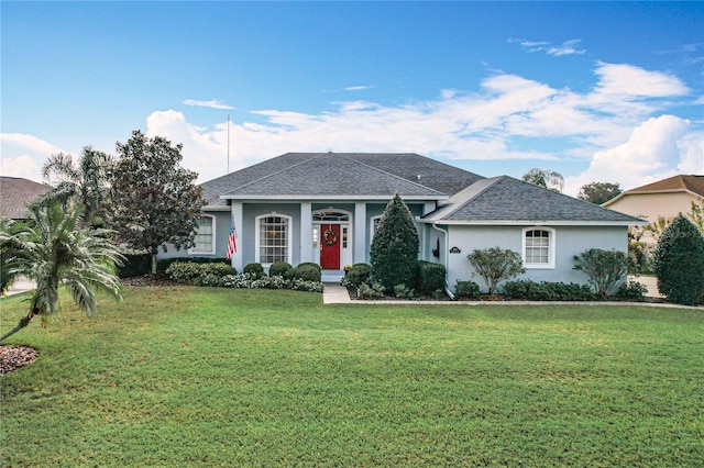 single story home with a front yard