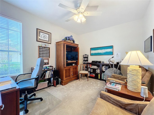 office area featuring light colored carpet and ceiling fan