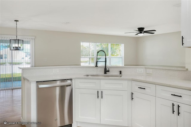 kitchen featuring white cabinetry, dishwasher, sink, hardwood / wood-style floors, and ceiling fan with notable chandelier