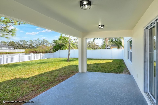 view of patio / terrace with a water view