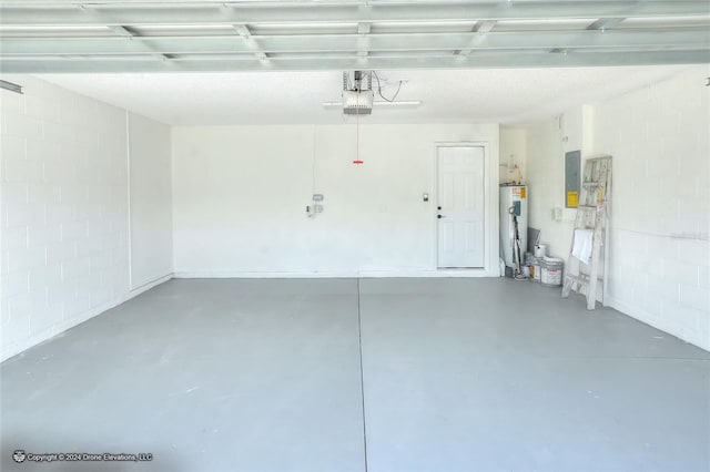 garage with a garage door opener, electric panel, and water heater