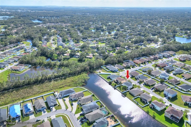 birds eye view of property featuring a water view