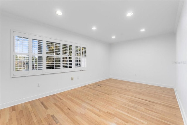 unfurnished room featuring light hardwood / wood-style flooring