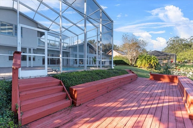 wooden deck with glass enclosure, a patio area, and a swimming pool