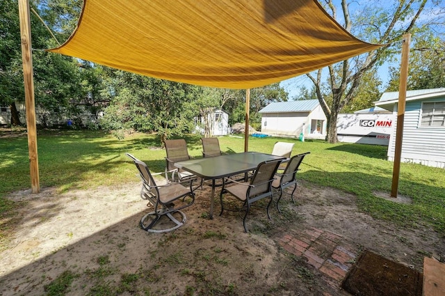 view of patio / terrace featuring a shed