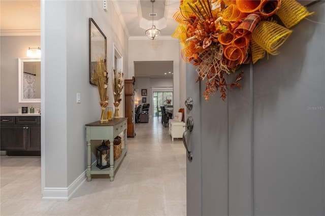 hallway featuring crown molding