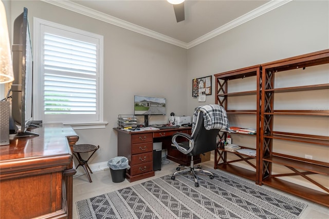 tiled home office with ceiling fan and ornamental molding