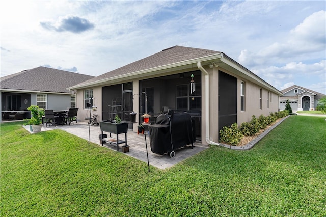 7929 Lake James Blvd, Lakeland, FL 33810 - back of property with a yard, a patio area, stucco siding, and a shingled roof