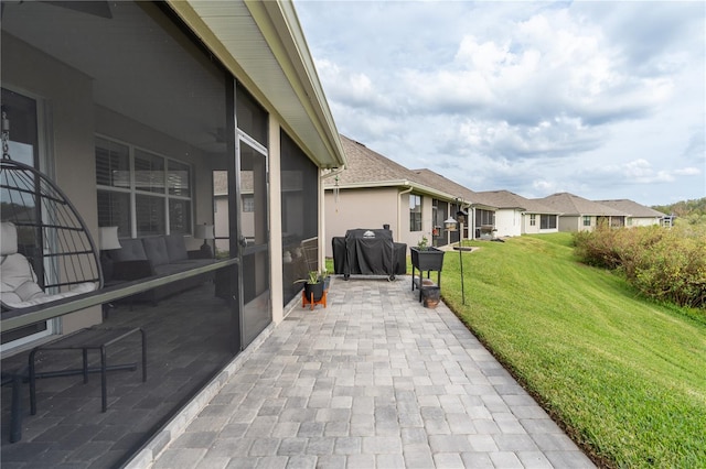 view of patio featuring a grill