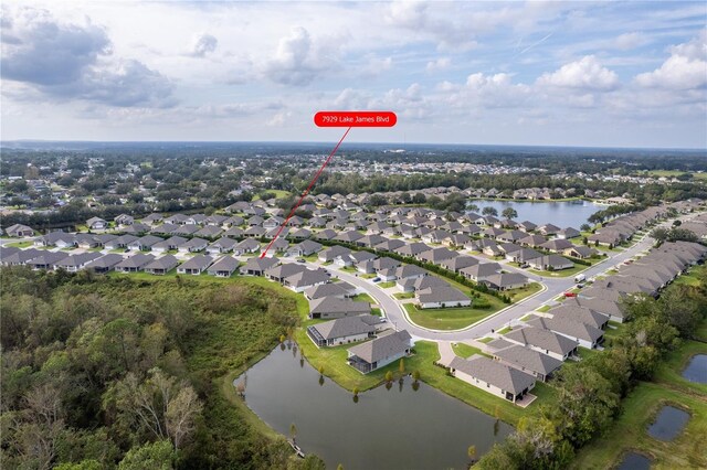 7929 Lake James Blvd, Lakeland, FL 33810 - aerial view of property's location with nearby suburban area and a large body of water