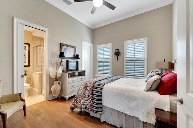 bedroom with ceiling fan, ornamental molding, ensuite bathroom, and light hardwood / wood-style floors