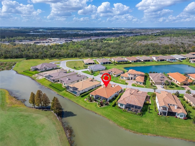 birds eye view of property featuring a water view