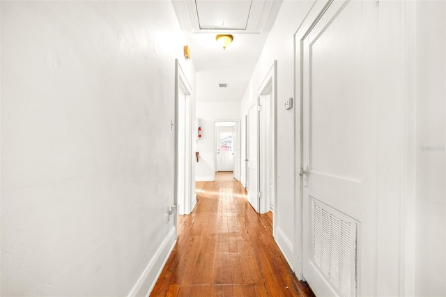 hall featuring hardwood / wood-style flooring