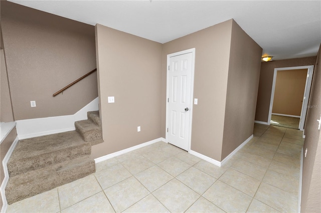 entrance foyer with light tile patterned floors