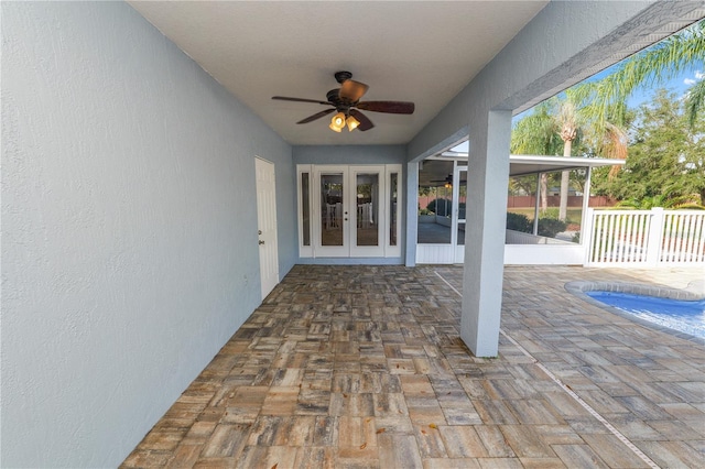 view of patio / terrace featuring french doors and ceiling fan