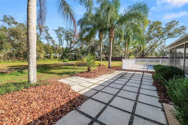 view of patio / terrace with a sunroom