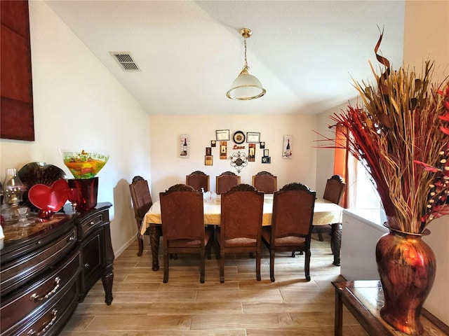 dining space featuring light hardwood / wood-style floors