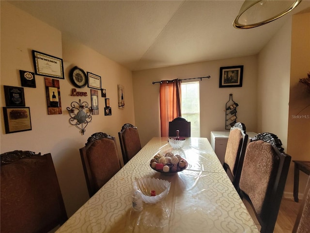 dining area featuring wood-type flooring