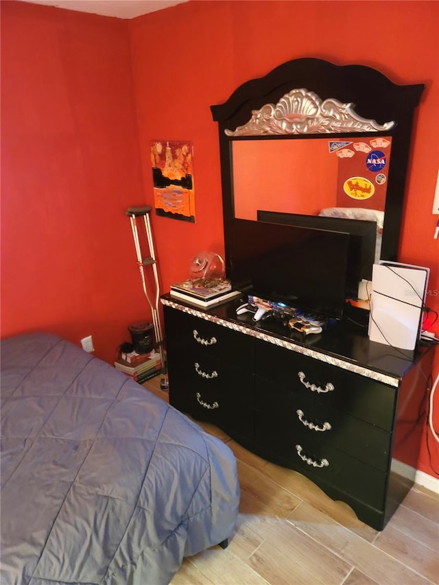 bedroom featuring light hardwood / wood-style floors