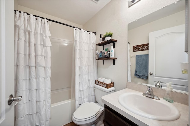 full bathroom with toilet, shower / tub combo, and vanity