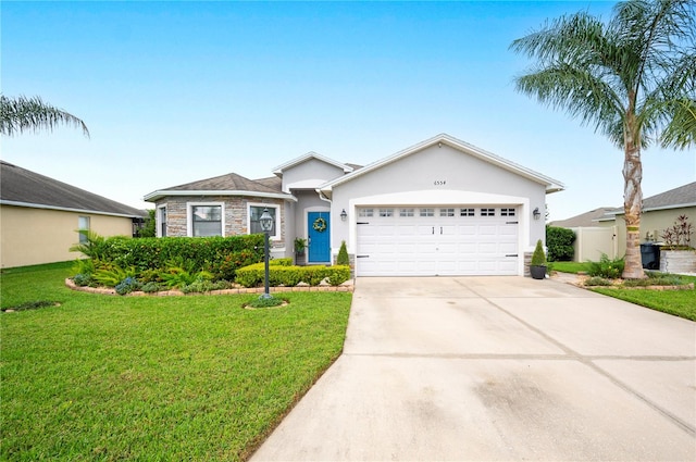 single story home featuring a garage and a front lawn