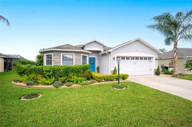 single story home featuring a garage and a front lawn