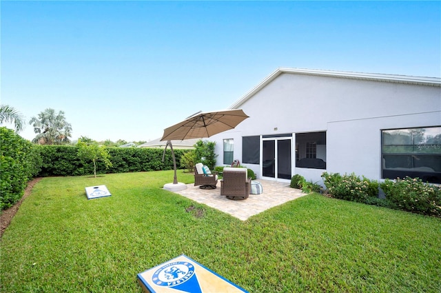 view of yard with a patio area and a sunroom