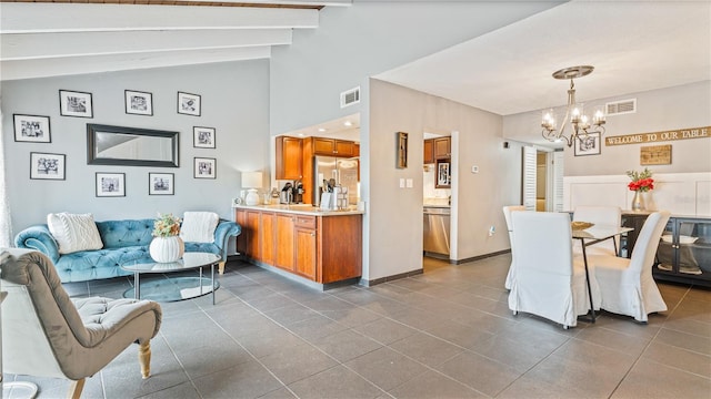 tiled dining room featuring lofted ceiling with beams and an inviting chandelier