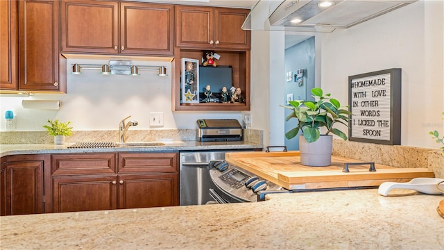 kitchen with sink and light stone counters