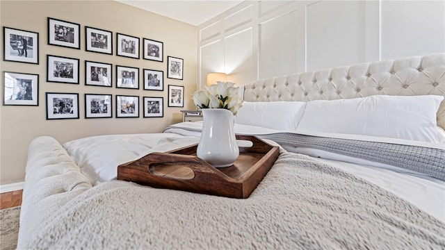 bedroom with hardwood / wood-style flooring