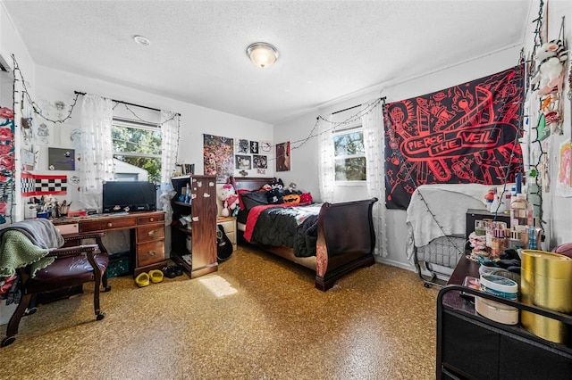 bedroom with a textured ceiling