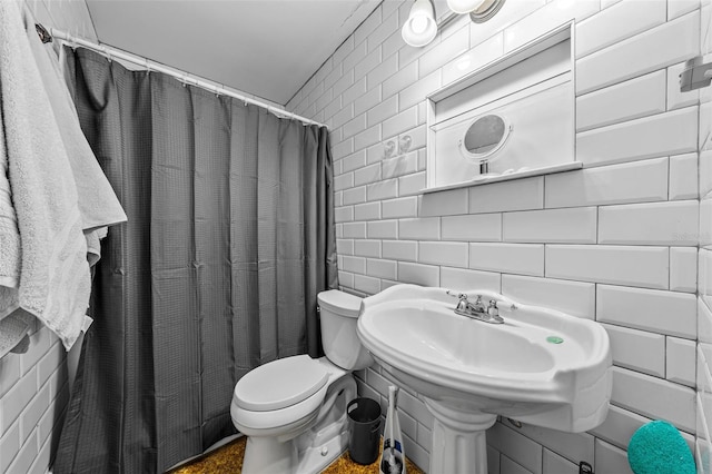 bathroom with toilet, tasteful backsplash, tile walls, and a shower with shower curtain