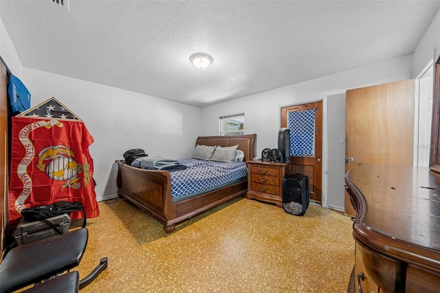 bedroom with a textured ceiling