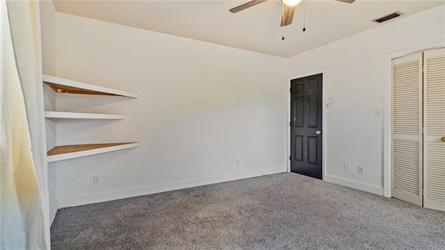 unfurnished bedroom featuring ceiling fan, a closet, and carpet floors