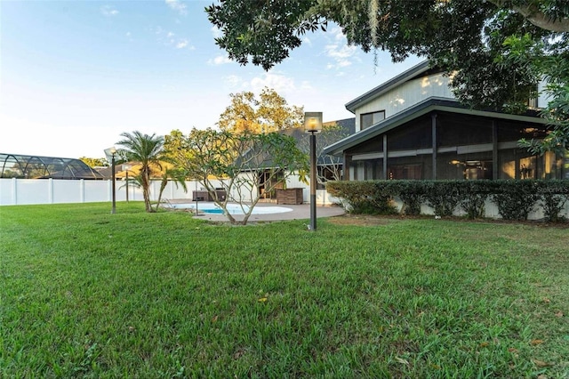 1215 Cypress Pt E, Winter Haven, FL 33884 - view of yard with a patio and a sunroom